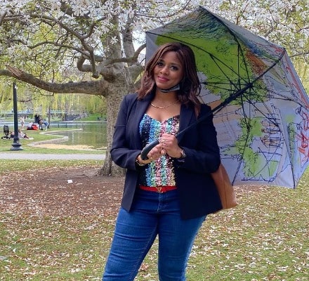 Richardson wearing blue pant and purple coat.